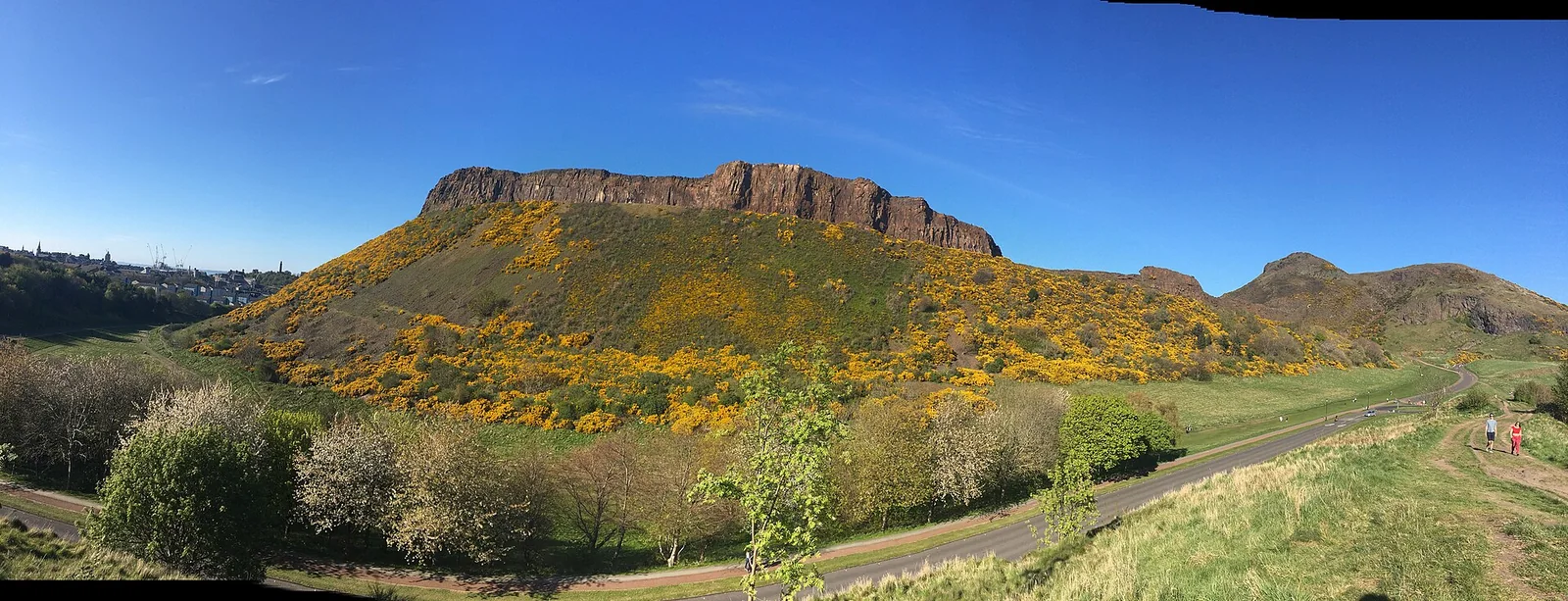 The crags and green slopes of Holyrood Park and Arthur's Seat in Edinburgh